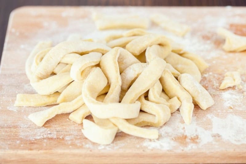 Egg noodles on the cutting board